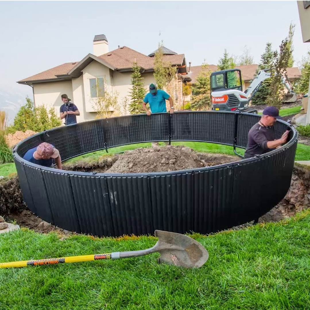 Placing the Frame in the Hole - Super Tramp Trampoline